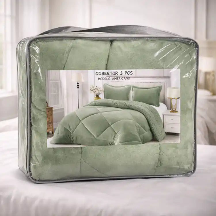 Cobertor verde y fundas premium de la marca Enigma Store, con textura suave y detalles elegantes para cama y sofá.