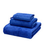 Set de 3 toallas azul de microfibra para cuerpo, manos y cara, de la marca Enigma Store, con textura suave y absorbente.