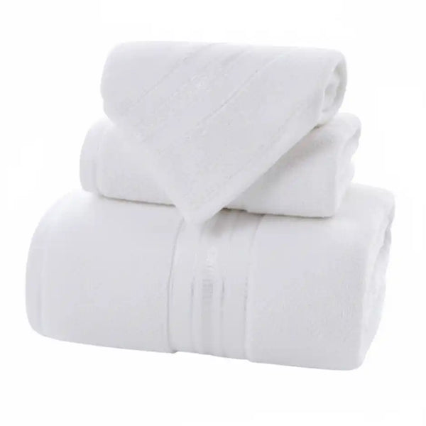 Set de 3 toallas de algodón para cuerpo, mano y cara de la marca Enigma Store, absorbentes y suaves.