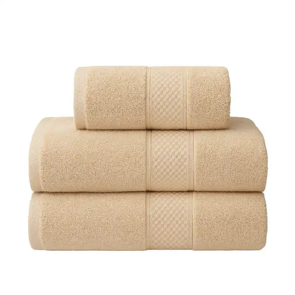 Set de 3 toallas de baño y mano Enigma Store, en colores suaves, con textura suave y absorbente para uso diario.