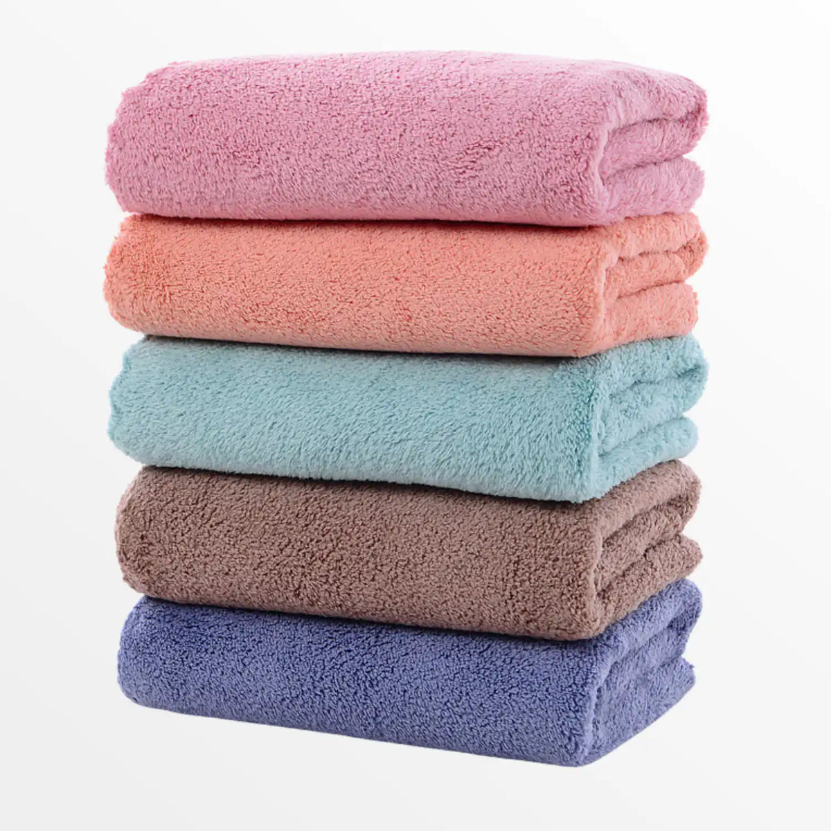 Tres toallas de microfibra para baño, secado rápido, ideales para deporte y viaje, en colores variados.
