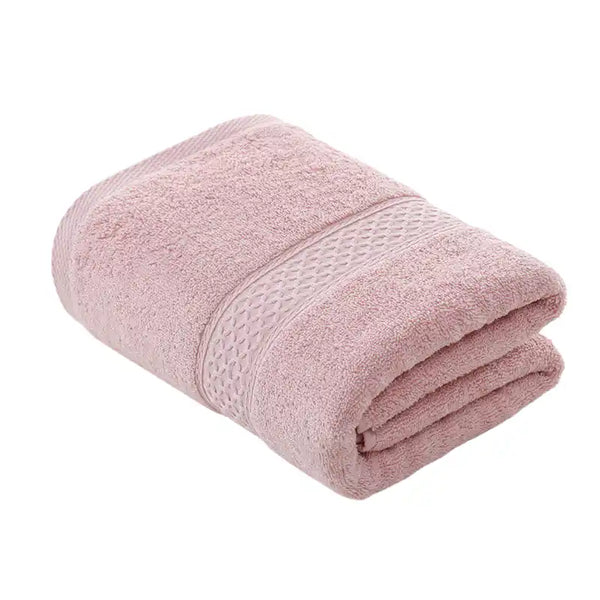 Toalla de baño de cuerpo gruesa de algodón en color blanco, fabricada por Enigma Store, con textura suave y absorbente.