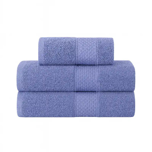 Conjunto de 3 toallas de baño y mano de la marca Enigma Store en colores suaves, con textura absorbente y suave.