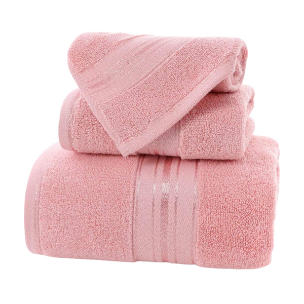 Pack de 3 toallas de cuerpo, mano y cara de algodón absorbente de la marca Enigma Store, en colores variados.