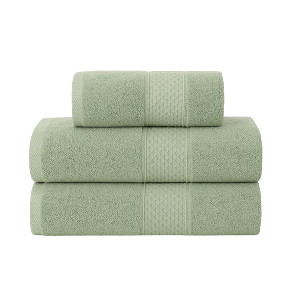 Set de 3 toallas de baño y mano Enigma Store en colores suaves, con textura acolchada y tamaño cómodo para uso diario.