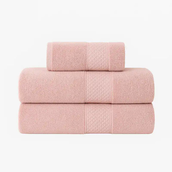 Pack de 3 toallas de baño y mano Enigma Store con textiles suaves y absorbentes, en colores neutros, para uso diario.