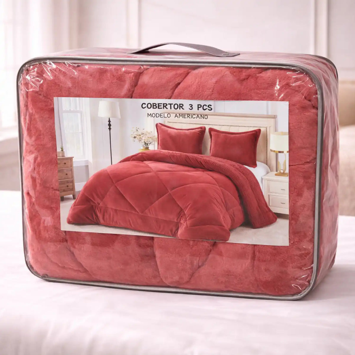 Cobertor burdeos y fundas premium de Enigma Store, muestra detalles de la textura suave y elegante en tonos rojos.