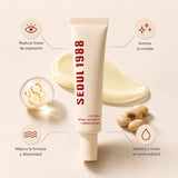 Crema de ojos K-SECRET Seoul 1988 con retinol liposoma 4% y fermento de soja, en tarro con envase blanco y tapa negra.