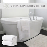 Dos toallas de baño grandes blancas de microfibra, tamaño 90x180 cm, con textura suave y absorbente en color blanco.