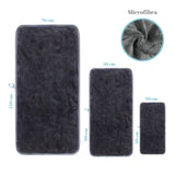Set de 3 toallas negras de microfibra para cuerpo, manos y cara, de la marca Enigma Store, en imagen.