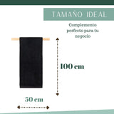 Tres toallas negras de algodón para peluquería y hotel, tamaño 50x100 cm, de la marca Enigma Store en la imagen.