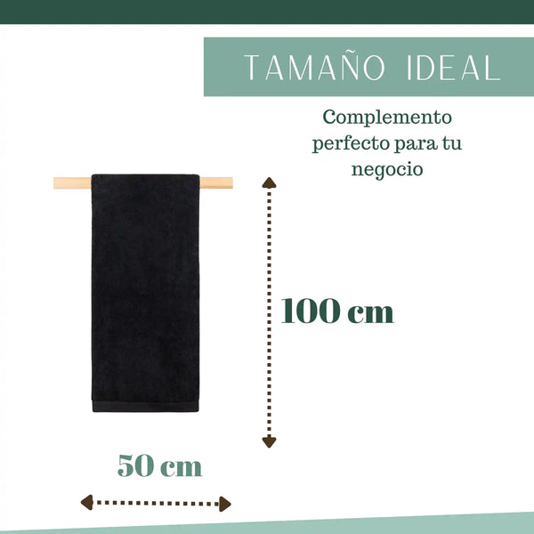 Tres toallas negras de algodón para peluquería y hotel, tamaño 50x100 cm, de la marca Enigma Store en la imagen.