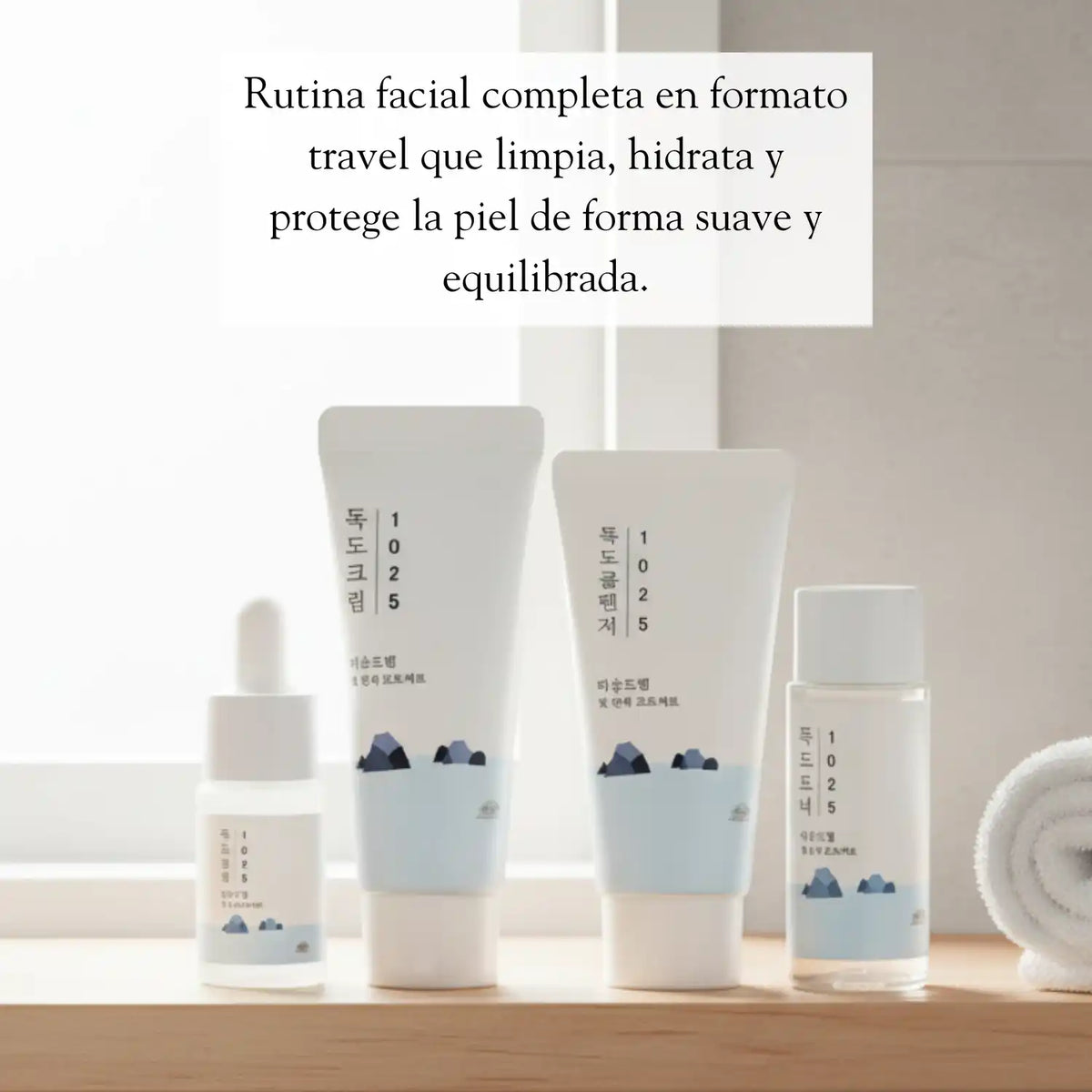 Kit de prueba de cuidado de la piel coreano ROUND LAB 1025 Dokdo con productos en envases pequeños y fórmula hidratante.