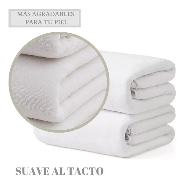 Dos toallas de baño grandes blancas de microfibra de 90x180 cm, suaves y absorbentes, en color blanco.