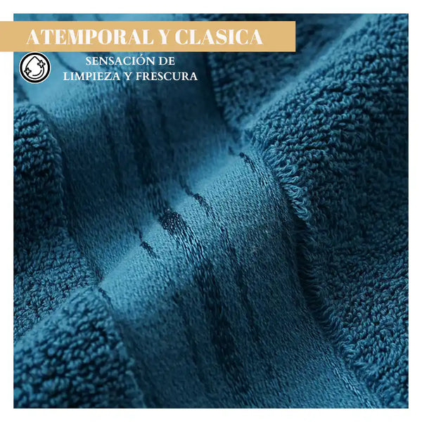 Toallas azul profundo de algodón de 130 g, paquete de 4, ideales para hotel y spa, con textura suave y absorbente.