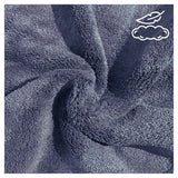 Set de 3 toallas negras de microfibra para cuerpo, manos y cara, de la marca Enigma Store, con textura suave y absorbente.