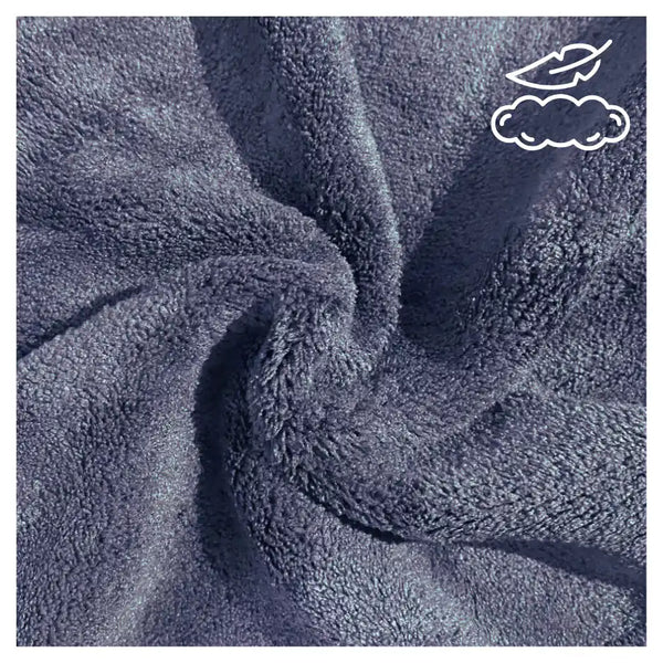 Set de 3 toallas negras de microfibra para cuerpo, manos y cara, de la marca Enigma Store, con textura suave y absorbente.