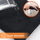 Pack de 3 toallas negras de microfibra para cuerpo, manos y cara, de la marca Enigma Store, en imagen.