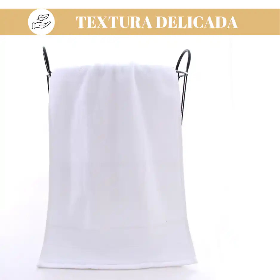 Pack de 4 toallas blancas de algodón de 130 g, ideales para hotel y spa, con textura suave y acabado de alta calidad.