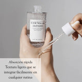 Ampolla coreana SKIN1004 Tone Brightening en frasco de 100ml, con fórmula para iluminar y mejorar la apariencia de la piel.