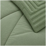 Set de cobertor Queen de 7 piezas en color verde, marca Enigma Store, con detalles suaves y cómodo para cama grande.