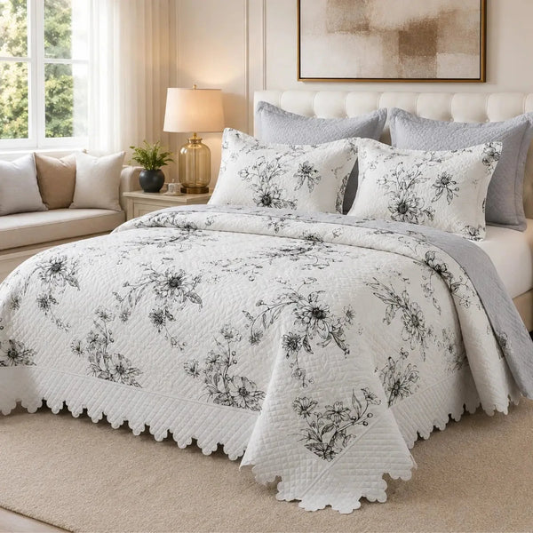 Cubrecama quilt bordado king de 5 piezas con flores grisáceas, estilo elegante y cómodo para dormitorio de Casa Eterna.